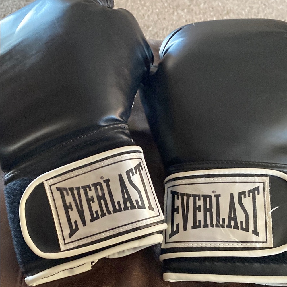 Everlast black boxing gloves.